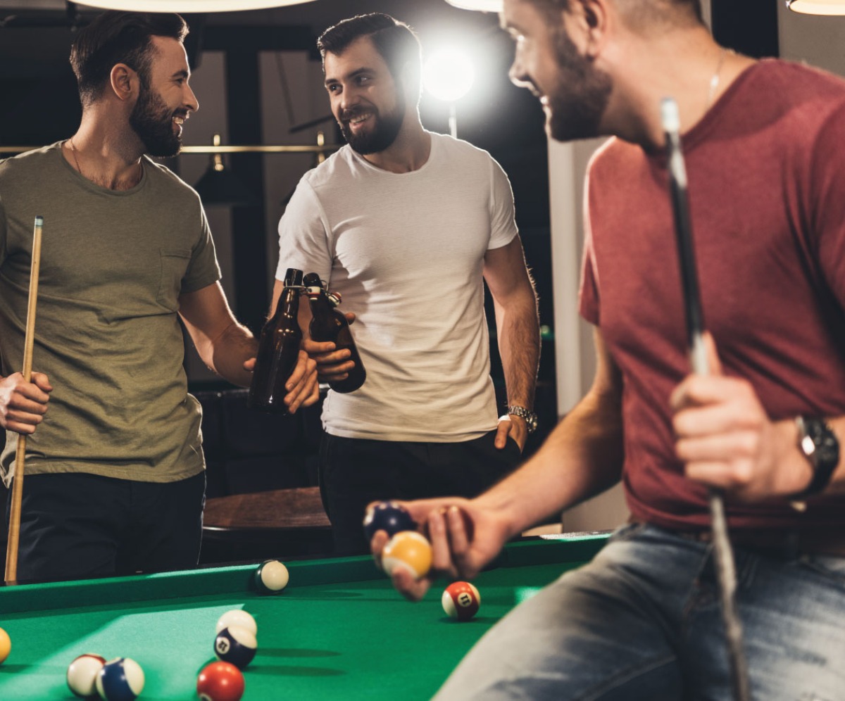 Friends Playing Pool Drinking